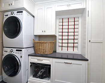 Custom laundry room storage solutions in Warren County, NJ and Monmouth County, NJ.